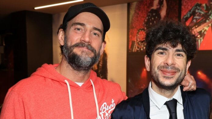 CM Punk and Tony Khan CM Punk and Tony Khan