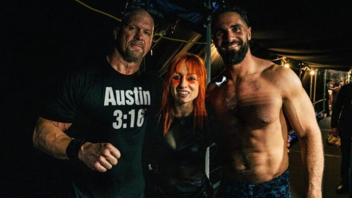 Steve Austin, Becky Lynch and Seth Rollins Steve Austin, Becky Lynch and Seth Rollins