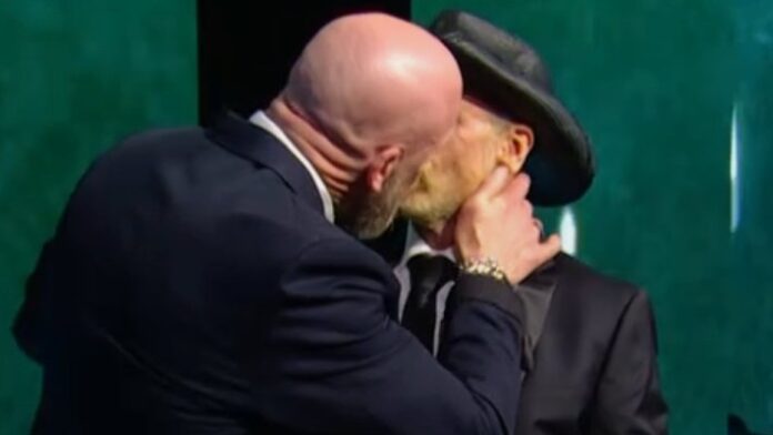 Triple H kisses Shawn Michaels Triple H kisses Shawn Michaels